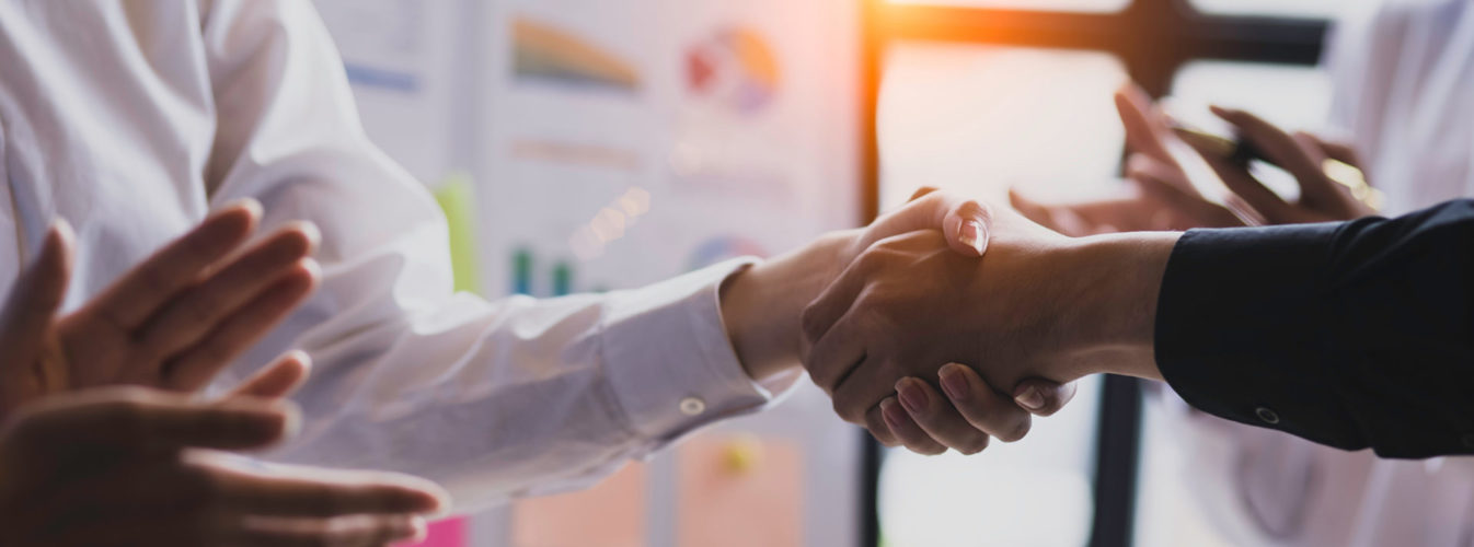 Business people shaking hands, Business partnership shake hand concept, blurred background.
